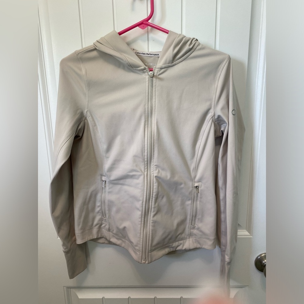 Calvin Klein Performance hooded Jacket. Size Small. Cream colored. Zippered